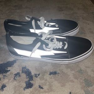 Black Low-Top Sneakers with White Lightning Detail - Men